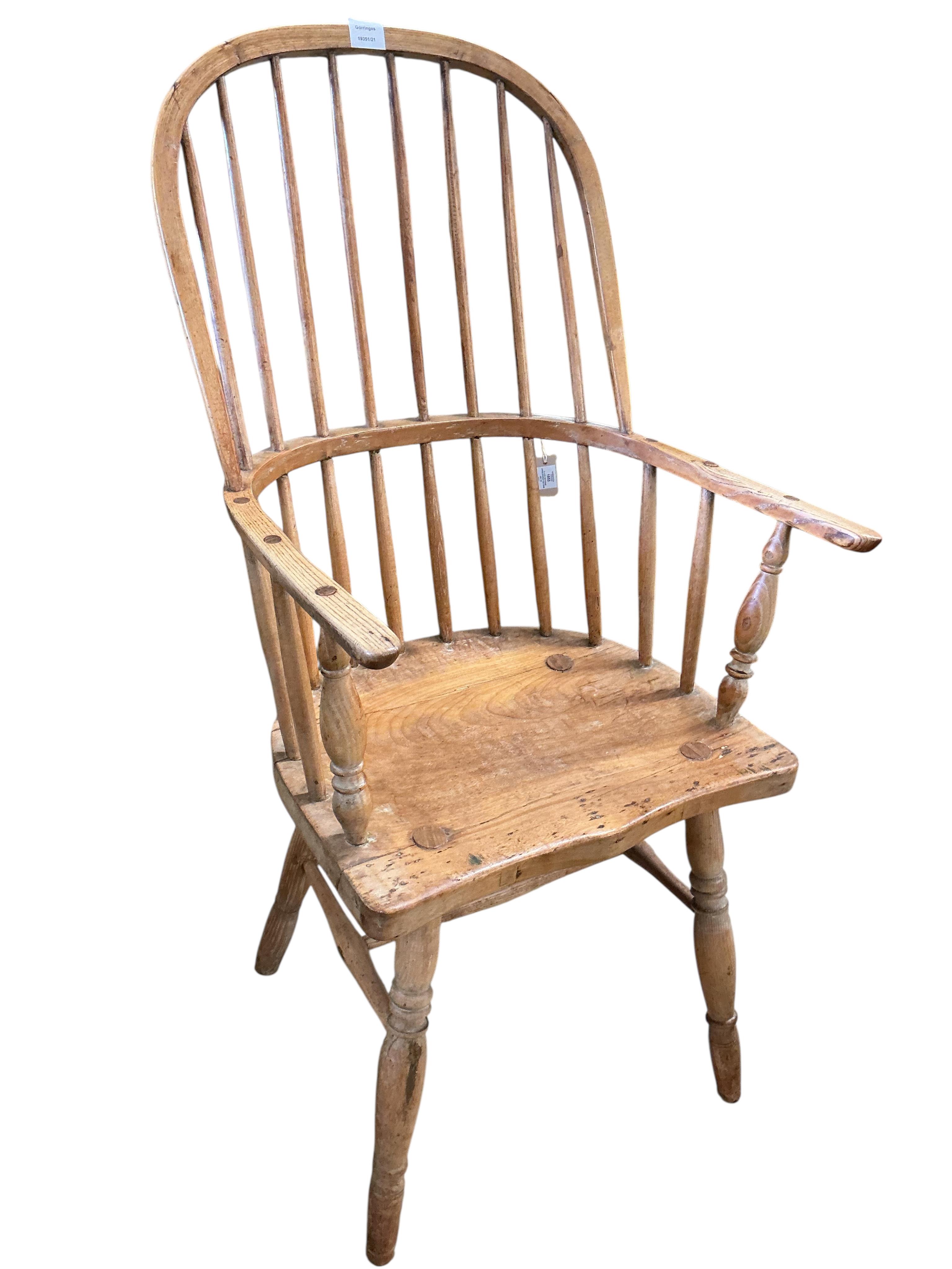 A 19th century ash and elm Windsor comb back armchair, width 56cm, depth 41cm, height 114cm